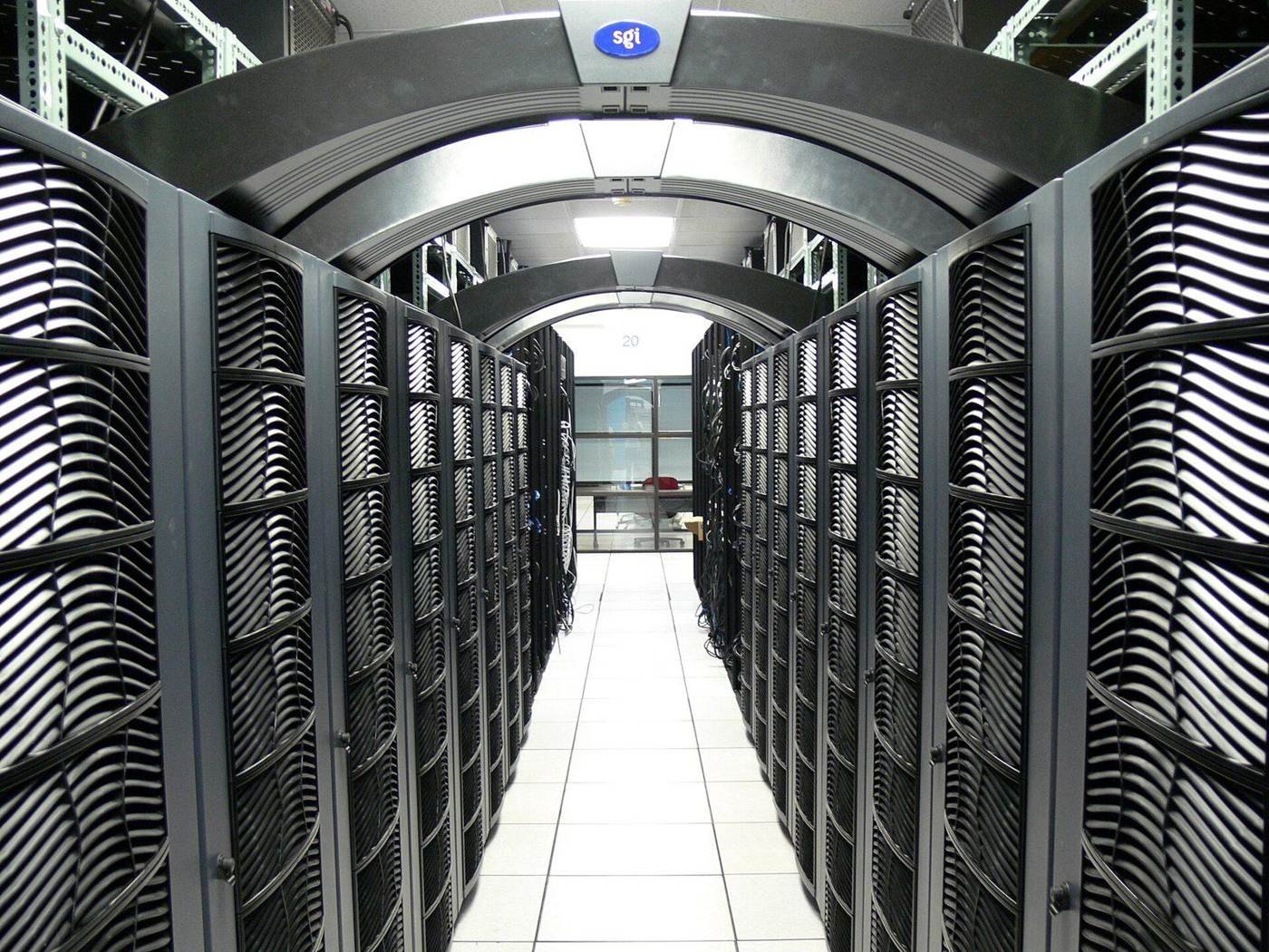 Server rack aisle inside a data center, the white space that MEP estimates are built around