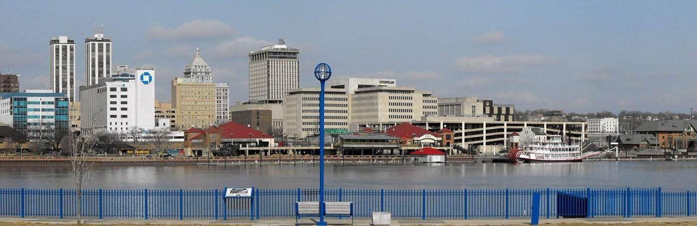 Peoria, Illinois skyline across the Illinois River, home base of Illinois Construction Estimators